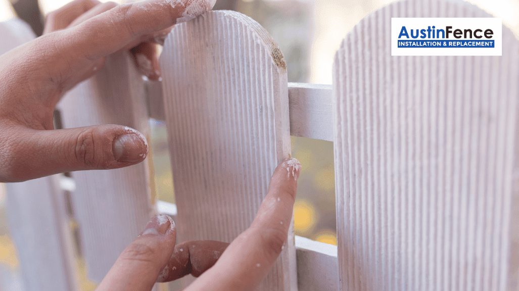 person inspecting the fence